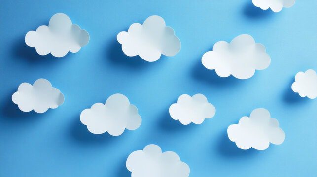 blue background with a bunch of paper cut clouds