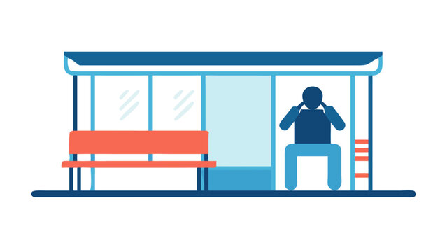 Man sitting alone at a bus stop