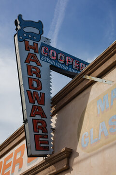 Neon sign featuring a saw at Cooper's Hardware, Sylmar, California, May 2020