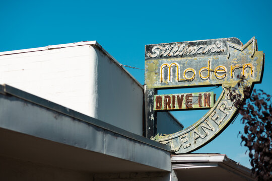 Weathered neon sign for a dry cleaners and laundry in Lompoc, California, December 2019