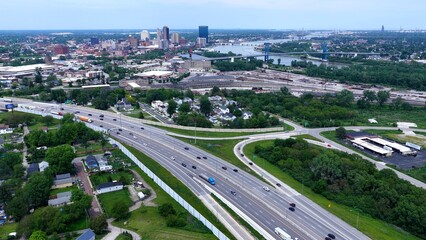 Fototapeta premium Interstate Highway outside of Toledo Ohio with view of Maumee River and Downtown city skyline