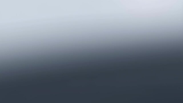 Minimalist grey gradient backdrop with soft lighting and sleek professional design for modern digital backgrounds and creative projects in 16 9 format