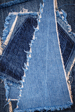Denim art shows pieces of different colors sewn together in a unique pattern