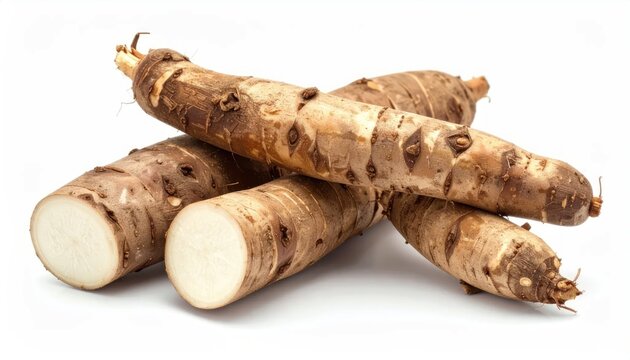 Fresh Brown Taro Roots Stacked on Clean White Background