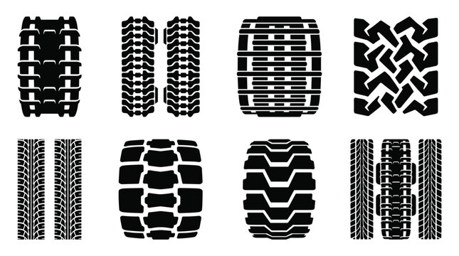 Collection of black tire tread patterns and heavy machinery tracks