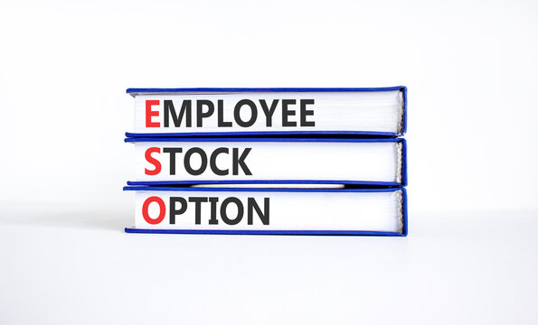 ESO employee stock option symbol. Concept words ESO employee stock option on beautiful books. Beautiful white background. Business ESO employee stock option concept. Copy space.