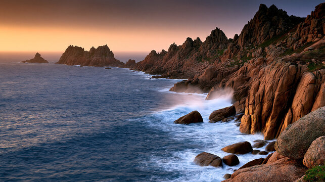 Coastal cliffs with crashing waves at golden hour