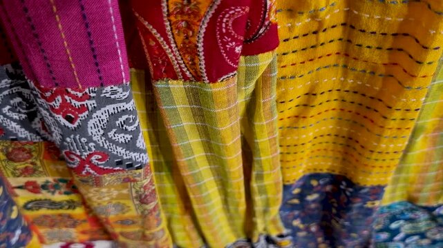 Vibrant colorful patchwork fabric texture with detailed traditional patterns