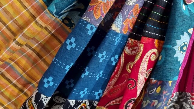 Vibrant patterned patchwork fabrics with detailed traditional designs
