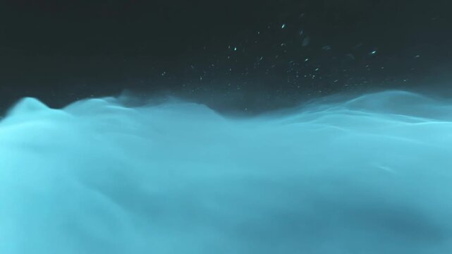 Cinematic ethereal blue fluid waves moving in dark space