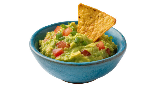Blue bowl of guacamole with tomato and scallion, topped with tortilla chip