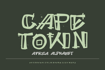 Ethnic African display font with tribal geometric details, perfect for safari branding, cultural posters, and earthy t-shirt designs. © nisyaprima