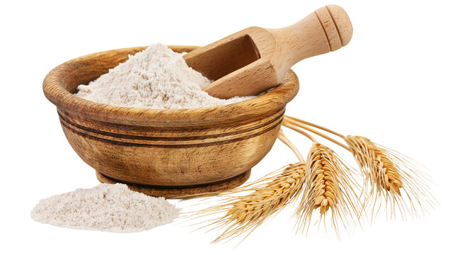 Wooden bowl of flour with scoop and wheat ears