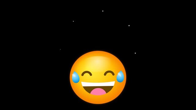Yellow laughing emoji face with tears of joy isolated on a black background.