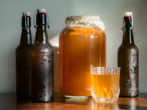 Kombucha on wooden table at home 