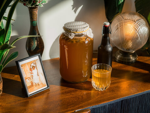 Kombucha Brewing Process Displayed on a Wooden Counter