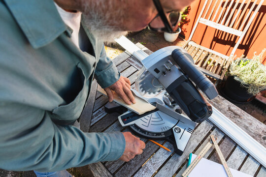 High Angle View of Woodworking with Power Tools