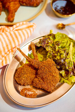 Images from Afri-cali dinner party concept with pork chop entree 