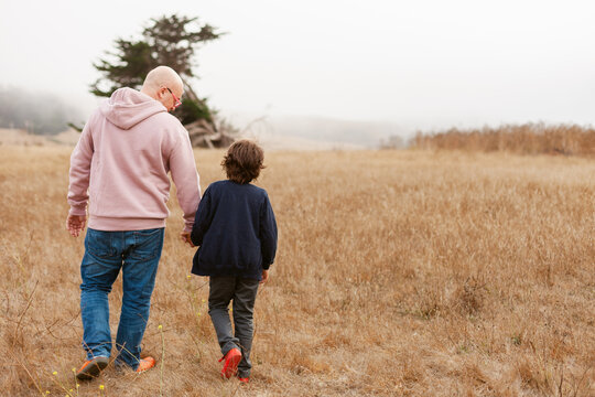 Walking Together Grassy Field