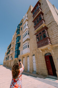 Woman taking photo with her cellphone 