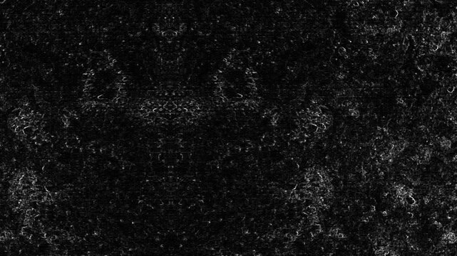 Very dark textured surface with faint symmetrical patterns, scattered speckles, and weathered appearance. Grunge texture background animation.