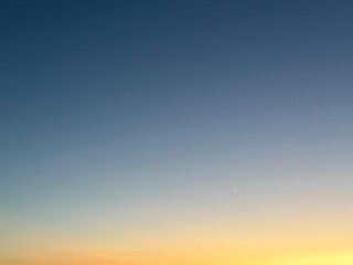 Venus, Jupiter, and Crescent Moon in Twilight Sky © Abdulkadir