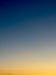 Venus, Jupiter, and Crescent Moon in Twilight Sky © Abdulkadir