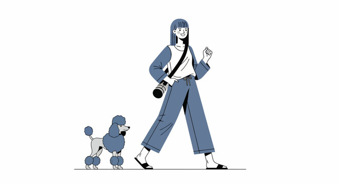 Woman walking her poodle on a leash outdoors.
