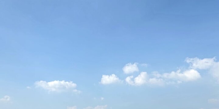 Cloudscape, Timelapse of Bright Blue Sky with Soft White Clouds and Copy Space for Background and Banner Design