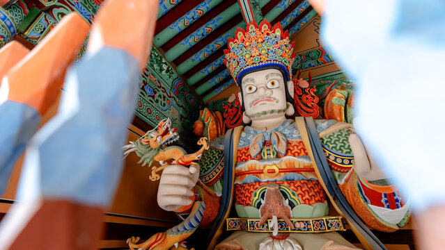 Intricate guardian statue at Beomeosa Temple, Busan