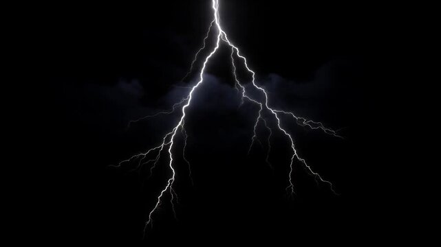 Bright white lightning bolt striking downwards from dark, stormy clouds, illuminating the night sky with a powerful electrical discharge during a dramatic and intense weather phenomenon