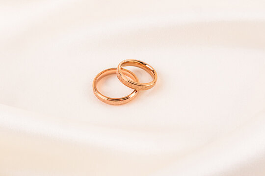 Elegant gold rings symbolize everlasting love