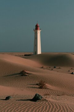 Lighthouse in the middle of desert.