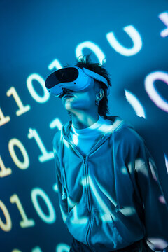 Futuristic cyberpunk woman using VR amid glowing code