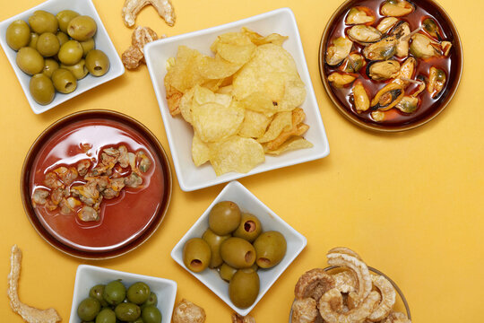 Spanish tapas snack assortment with olives and seafood