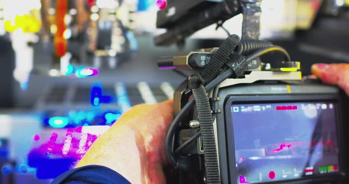 The videographer works at a microelectronics manufacturing plant.