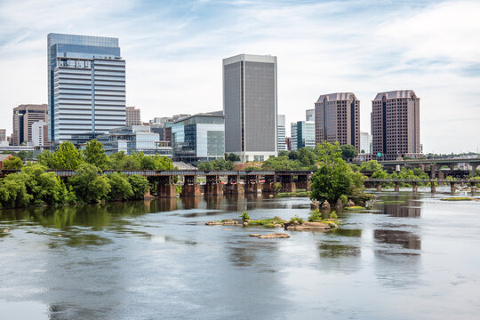 Richmond, Virginia cityscape with the James River in the foreground