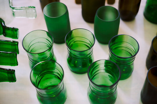 Green fused glassware made from recycled bottles