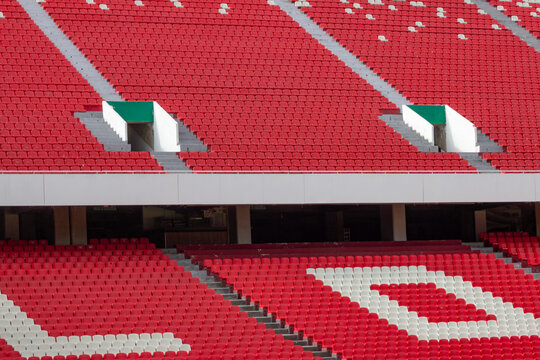 Empty red stadium seats anticipating big football events