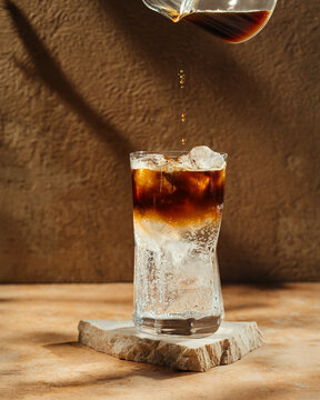 Espresso tonic with ice cubes in a glass