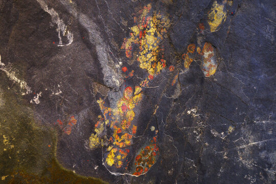 Abstract patterns and colors on a natural rock surface