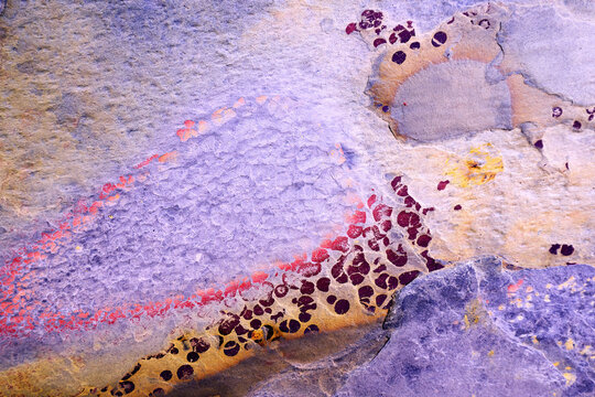 Abstract textured rock with vibrant colors