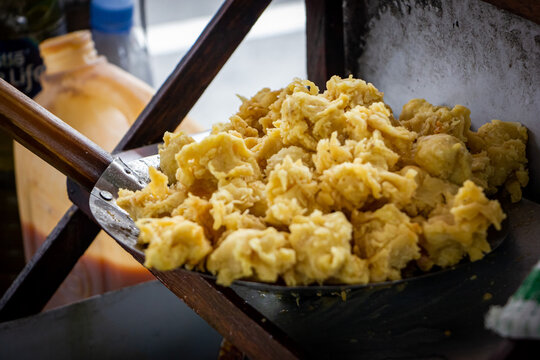 Cooking fried crispy chicken on the street