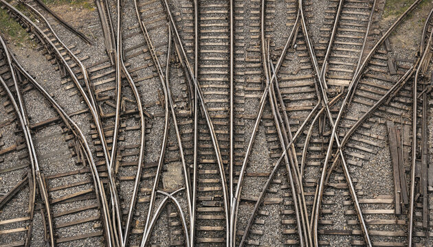 Top down view of intricate railway track junctions with junction railroad infrastructure transportation overhead crossover switches transport logistics engineering geometry commuter