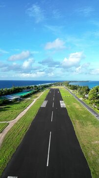 Droning on an airstrip in Tuvalu. Probably the only airstrip you can do that on. Dog on the runway