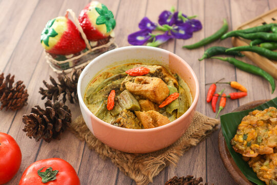 Orem‑orem, a traditional dish from Malang in East Java, a part of Indonesian cuisine. Made with tempeh or tofu, eggplant, bird's eye chilies, and thin coconut milk infused with turmeric.