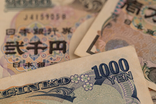 Japanese yen banknotes background close up