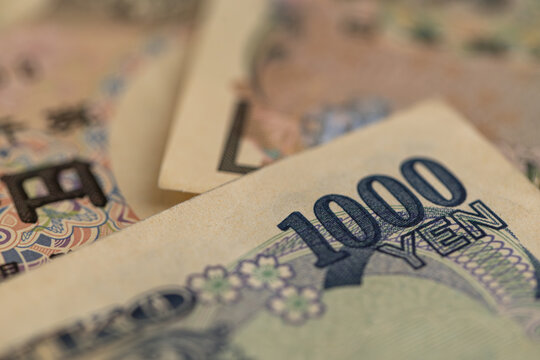 Japanese yen banknotes background close up