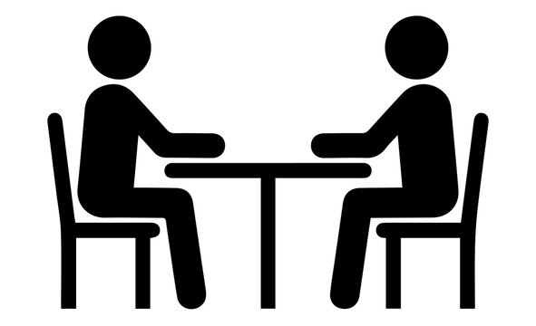 Two people sitting at a table icon meeting silhouette with business communication collaboration