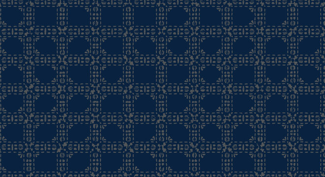 Dark blue fabric texture with gray plaid pattern featuring a distressed, embroidered, and rustic crosshatch design, creating a classic textile background.
